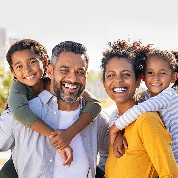 family smiling big