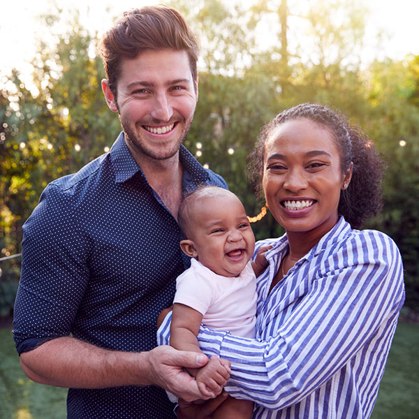 family smiling to camera